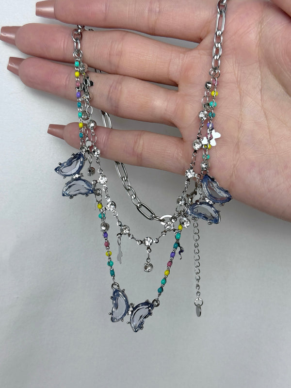 Blue crystal butterfly tassel necklace